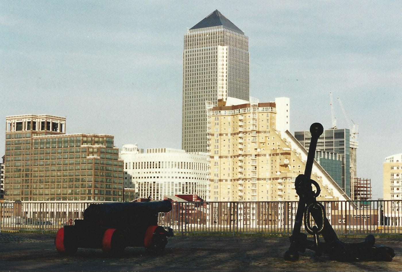 Canary Wharf and cannon photograph by Reginald Beer