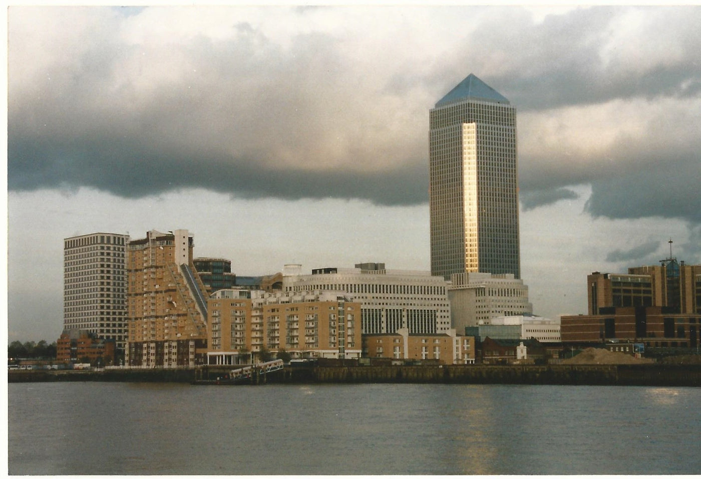 Canary Wharf and cloud photograph by Reginald Beer